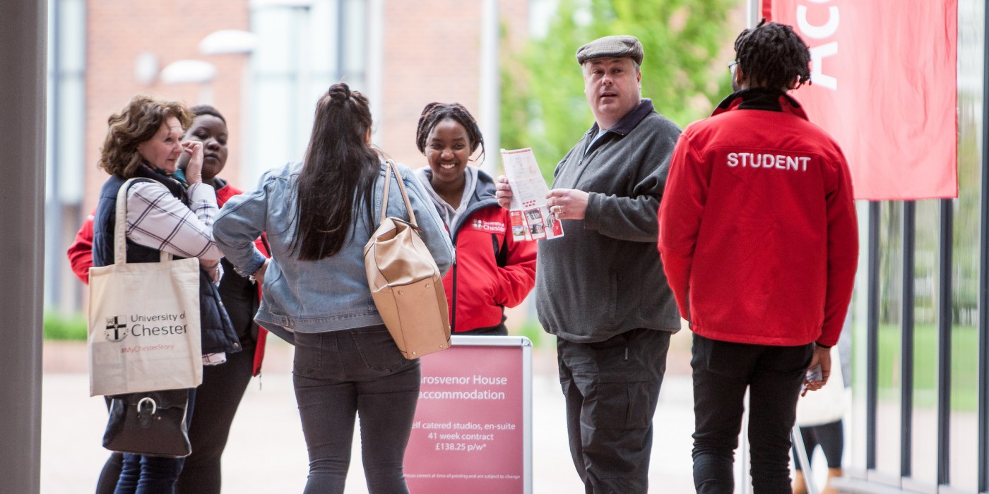 Students and staff offering an information service