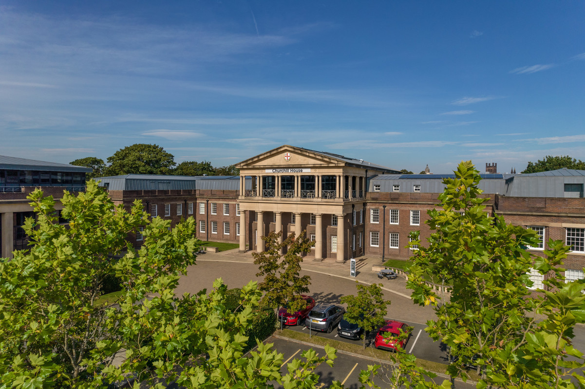 An exterior photo of the front of Queen's Park in Chester