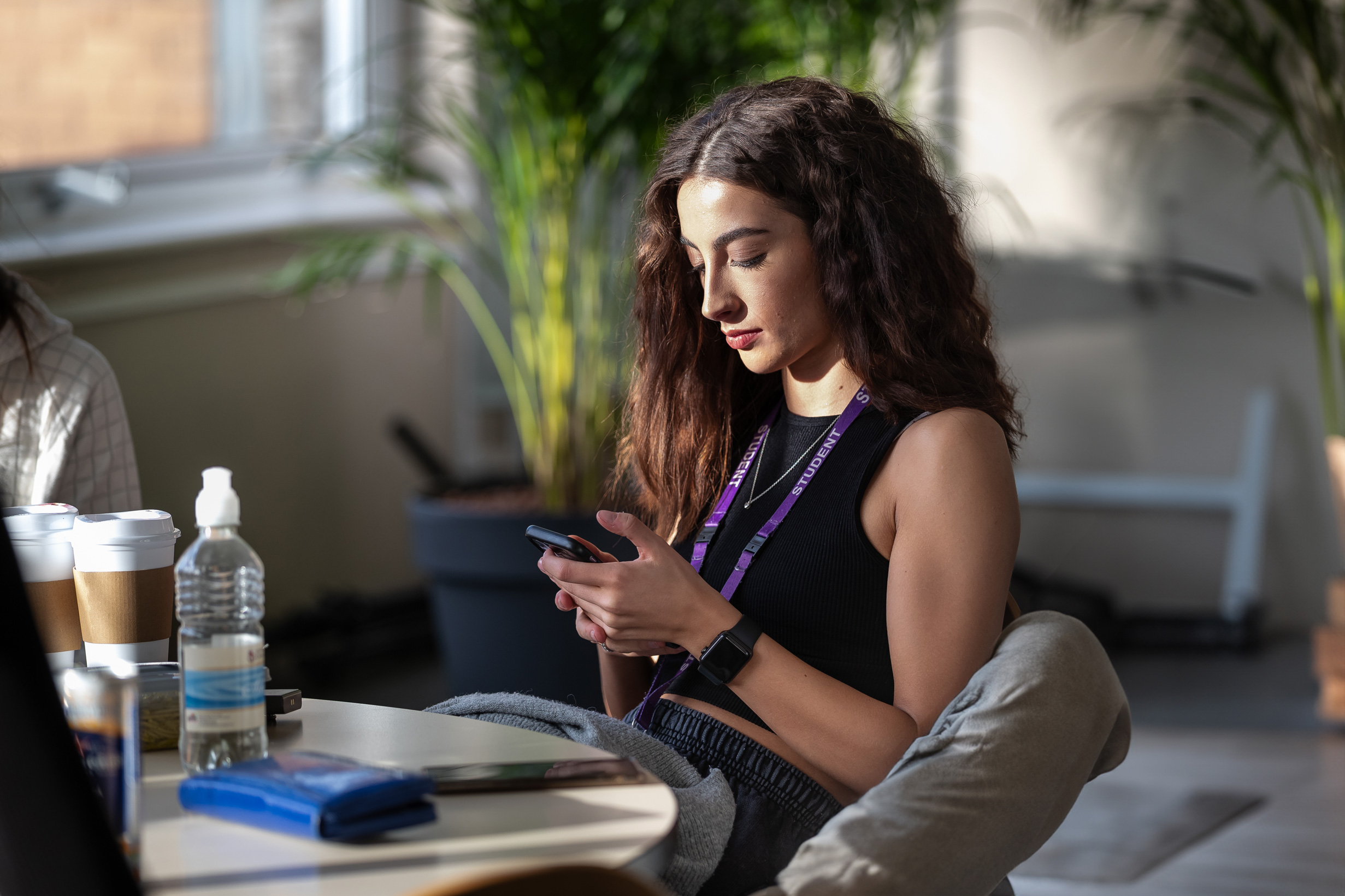 A student using their mobile phone
